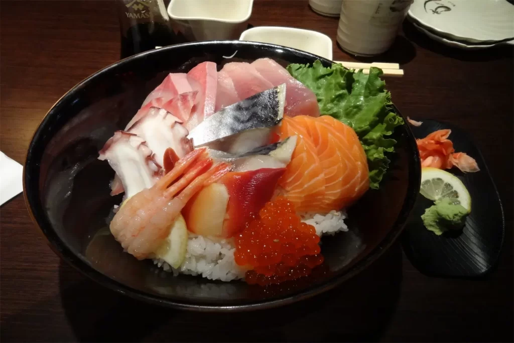 Abundant seafood chirashi rice bowl with fish roe at Otoro Sushi & Ramen, a Sushi Restaurant in Omaha