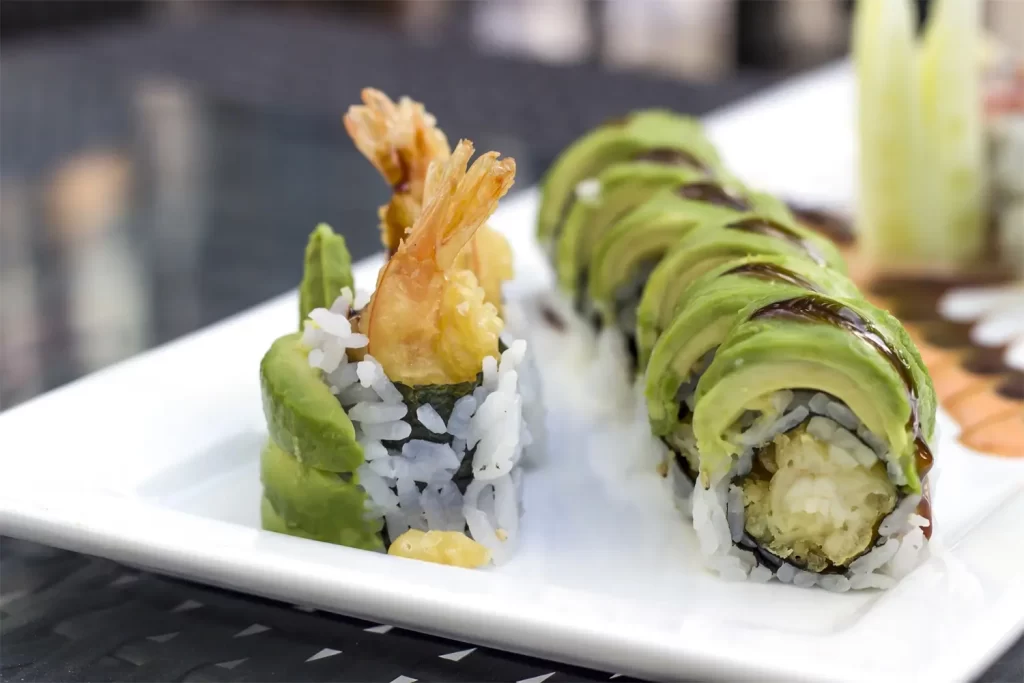 Avocado shrimp tempura sushi rolls with eel sauce at Otoro Sushi & Ramen, a Sushi Restaurant in Omaha